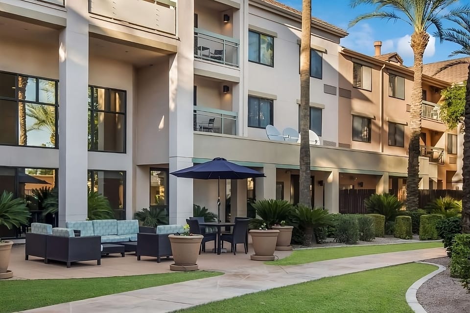 Arrive to palm-lined serenity and sunlit courtyard seating.