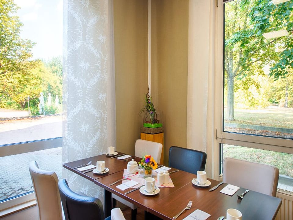 Sip fresh coffee by the window with garden views.