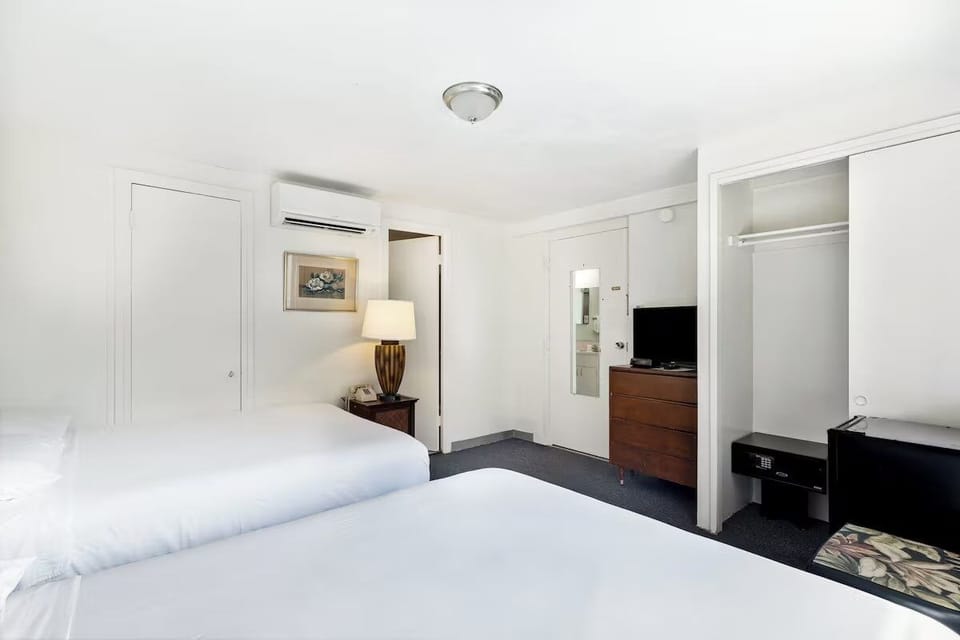 Stretch out comfortably with plenty of room around both beds.