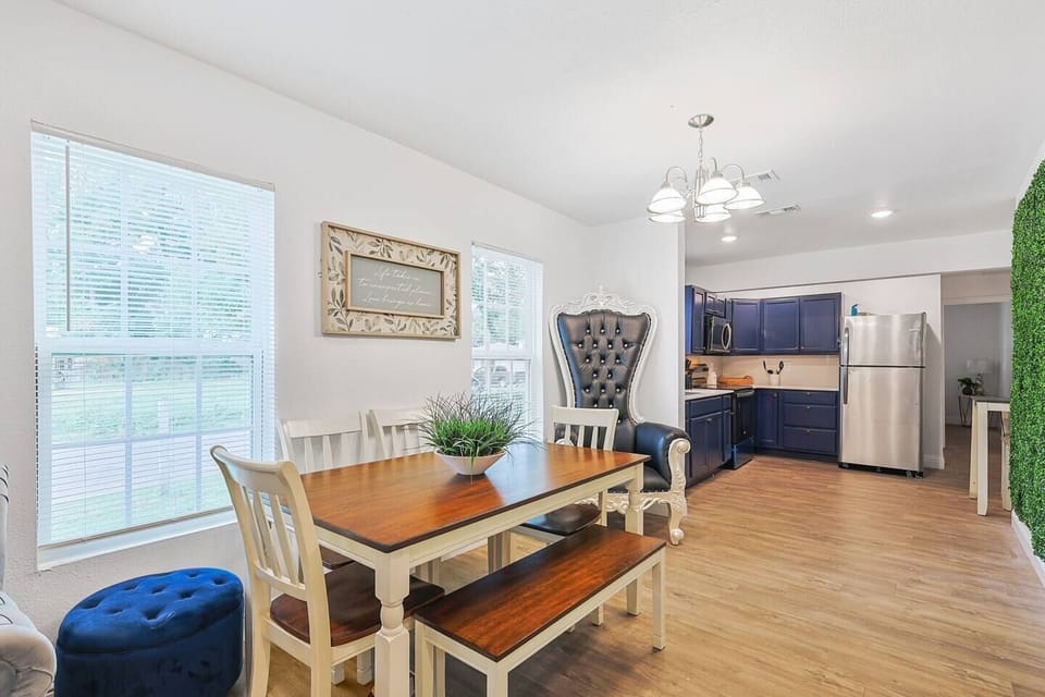 Spacious dining area with seating for six, perfect for family meals