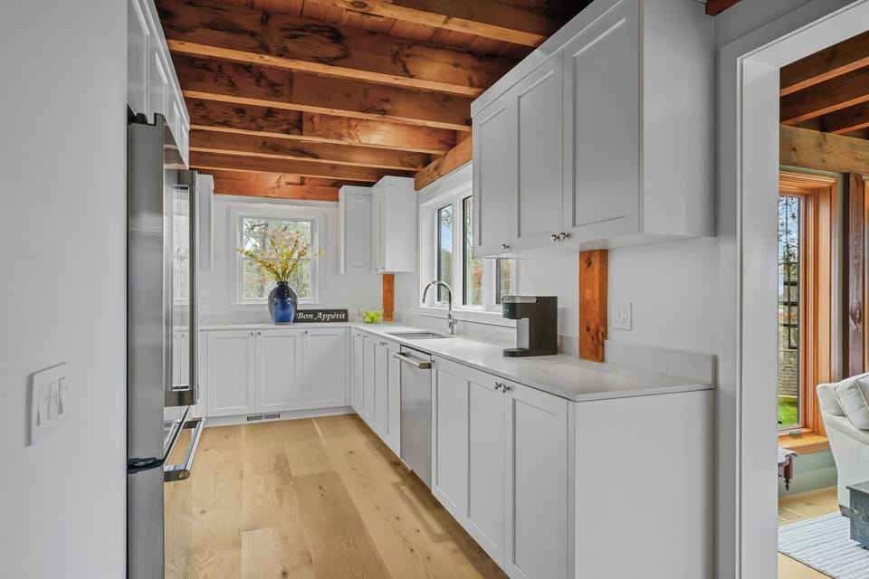 Bake memories under historic beams in a chef's kitchen built for gathering.