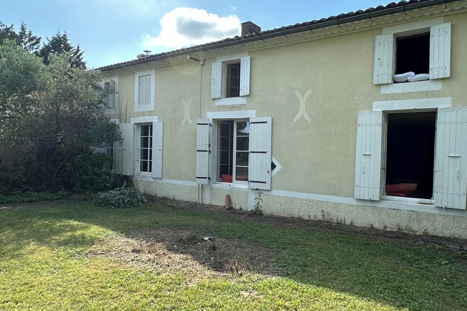 Traditional Charentaise house with a 2 storey front and single rear with a storage loft above