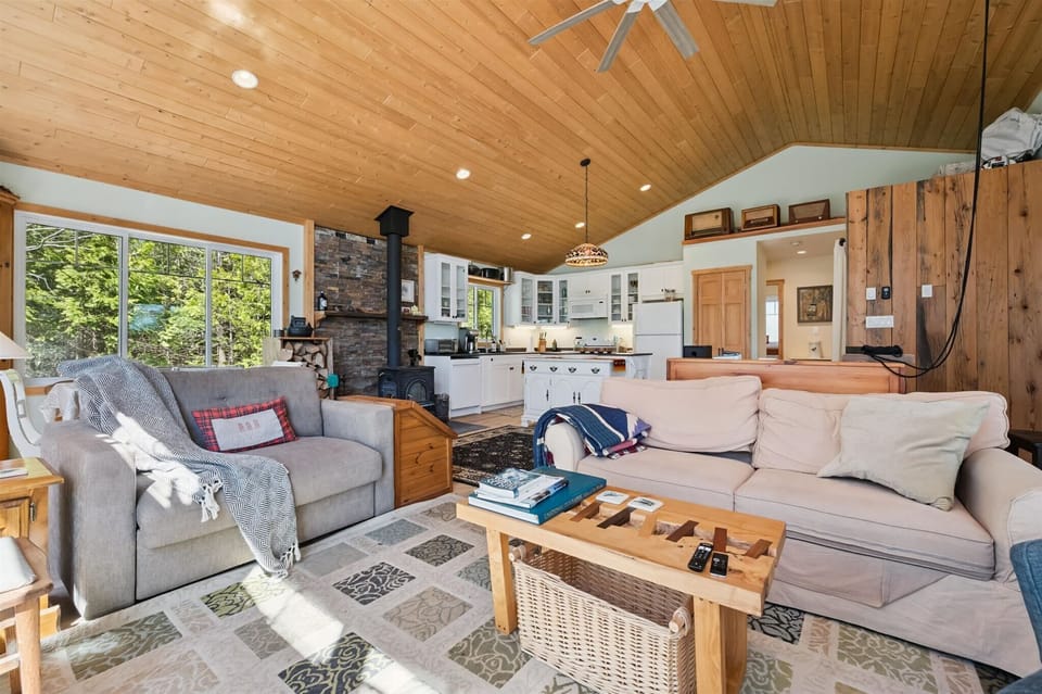 Gather with family and friends in the heart of the cottage, where the kitchen, dining, and living areas create the perfect space to connect.