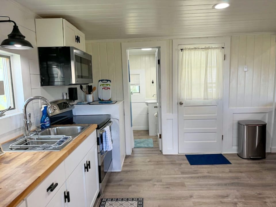 Kitchen, Bath, and Entrance to Back Yard