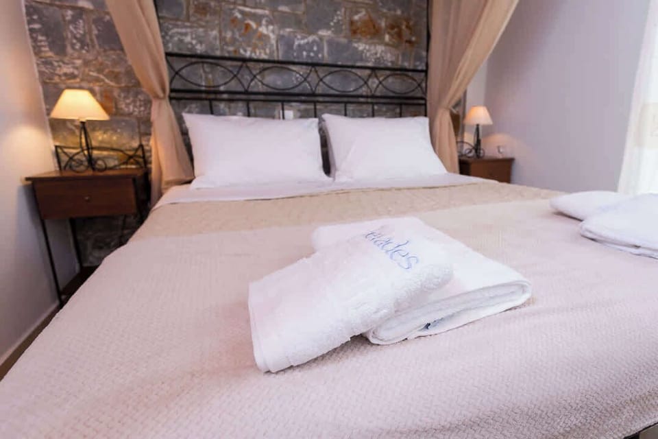 Soft bedding and fresh towels prepared for your arrival.