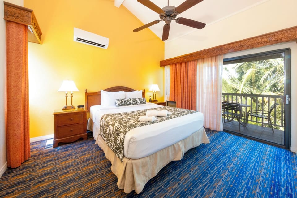 Wake up to palm views from your private lanai.