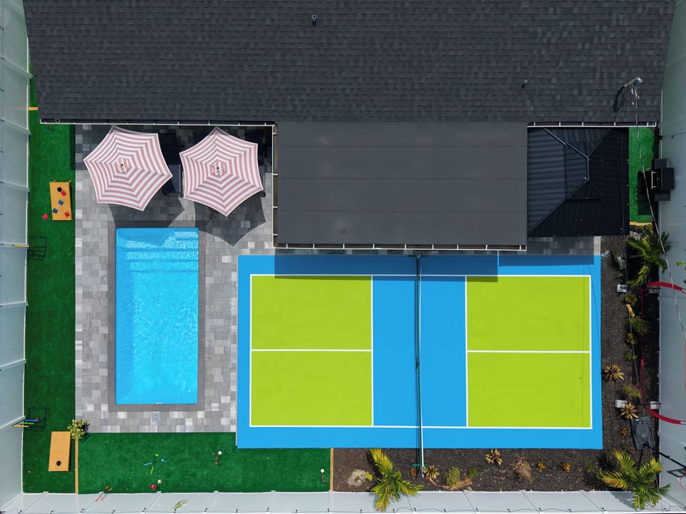 Private pool and vibrant sports court for the ultimate backyard getaway
