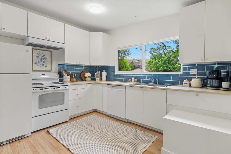 Bright kitchen with full appliances