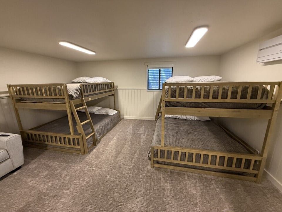 Basement bunk room with queen on bottom and full on top