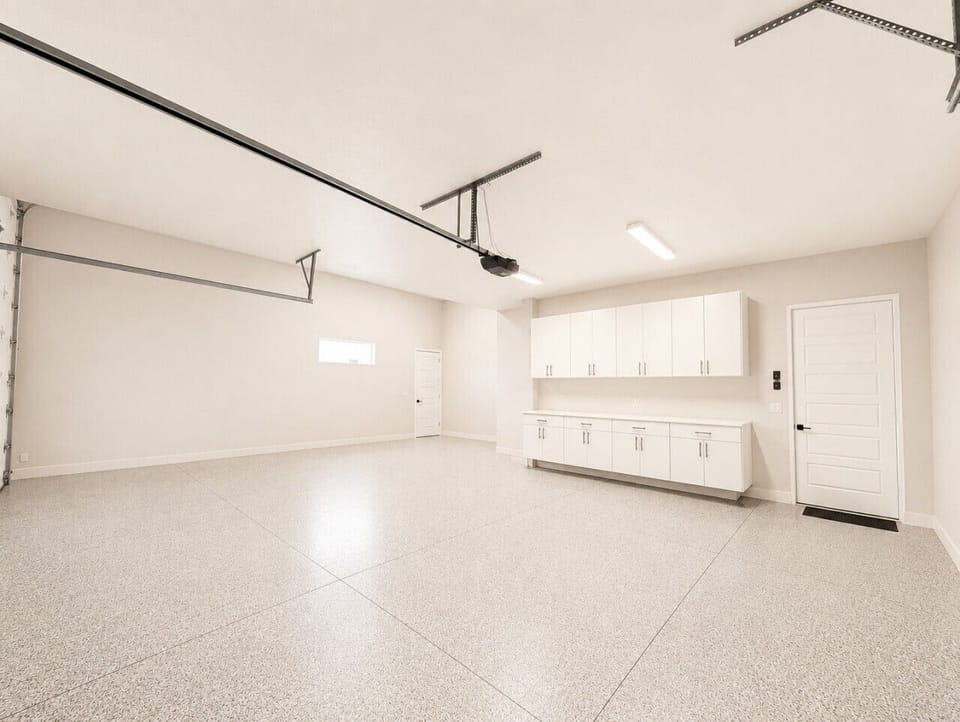 Three car garage with storage counter space