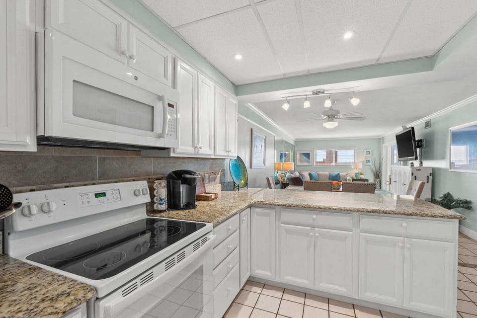 The kitchen is fully equipped with all the essentials, making meal prep simple and convenient.
