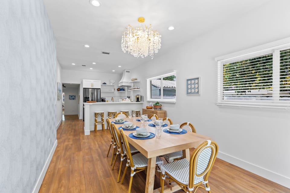 Spacious dining room overlooking the fully equipped kitchen.