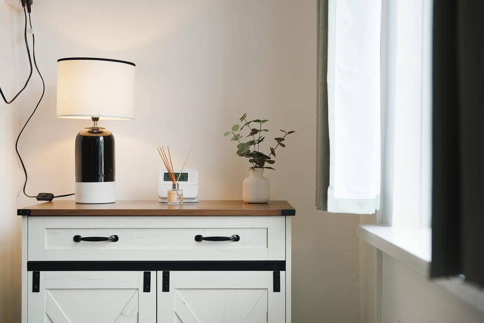 Spacious and welcoming, the living room includes a comfortable sofa bed, coffee table, TV, free Wi-Fi, and practical storage solutions. Whether you're relaxing with a film or enjoying cards and dominoes, it's a comfortable space for everyone.