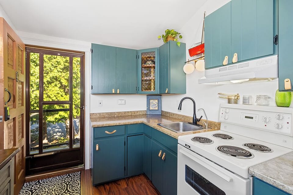 The fully equipped kitchen makes preparing meals easy, with everything you need just steps from the deck.