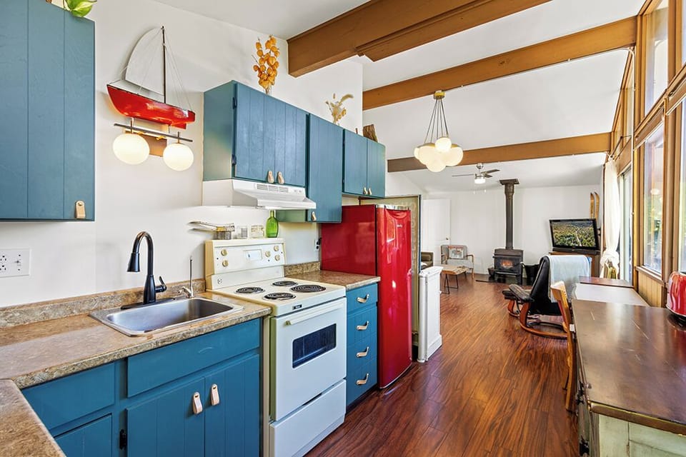 The open-concept kitchen flows seamlessly into the living area, making it easy to cook, gather, and relax together.