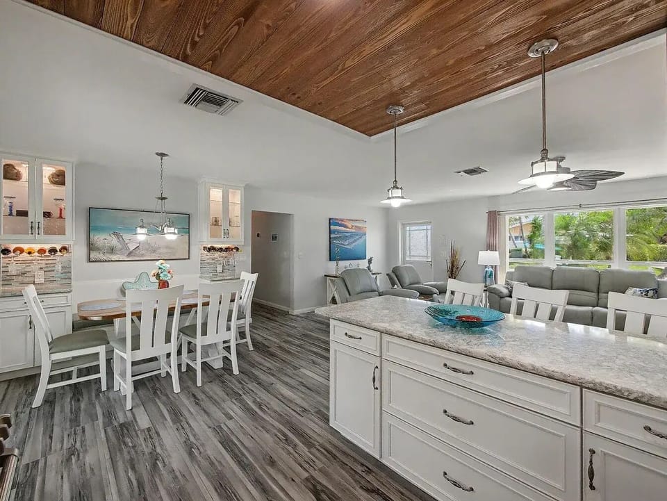 The perfect central gathering spot, offering a spacious layout where everyone can relax and hang out together.