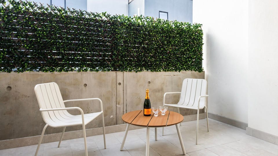 Enjoy a private outdoor patio, perfect for morning coffee or evening relaxation.