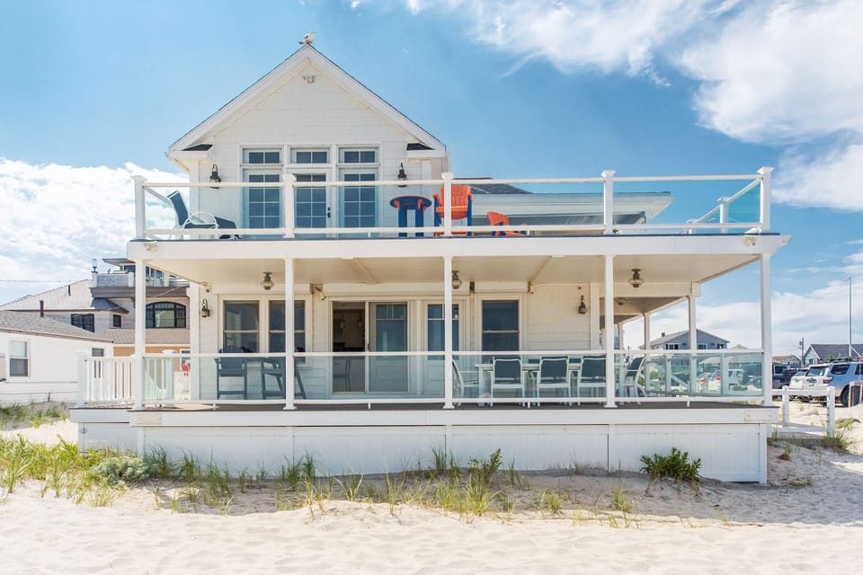 Enjoy views of Hampton Beach directly from the wrap around porch