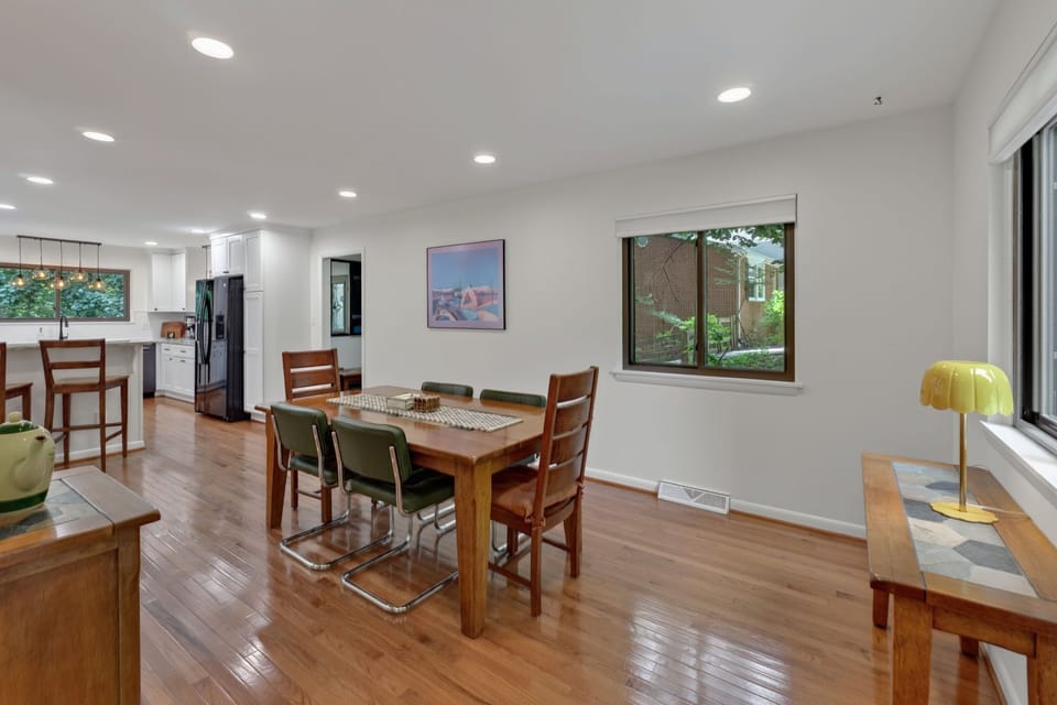 The dining room and kitchen are open to one another
