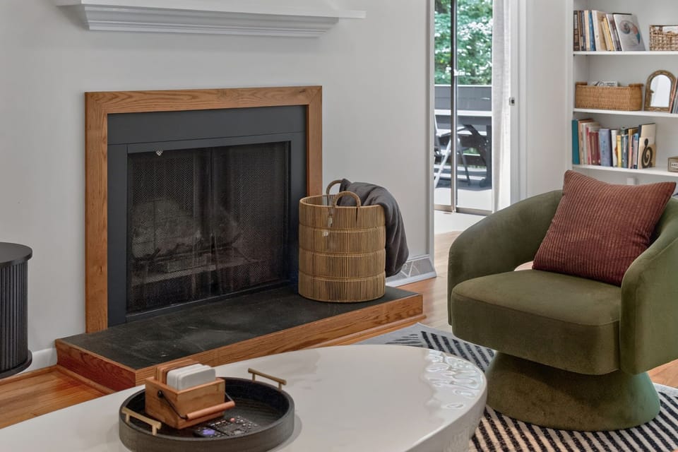 The wood burning fireplace is ready for cozy nights!