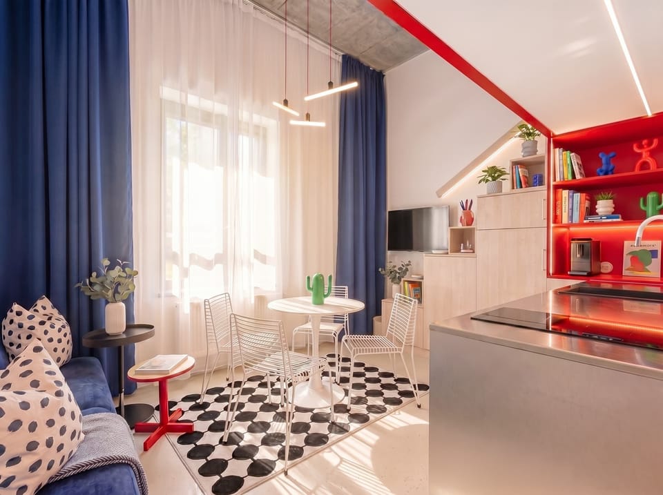 Beautiful loft apartment with living room in lower floor and two queen size beds in upper floor to accommodate up to 6 people