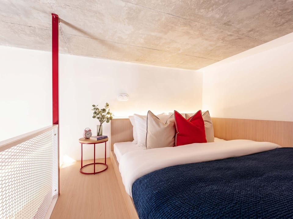 Second queen size beds in the upper floor