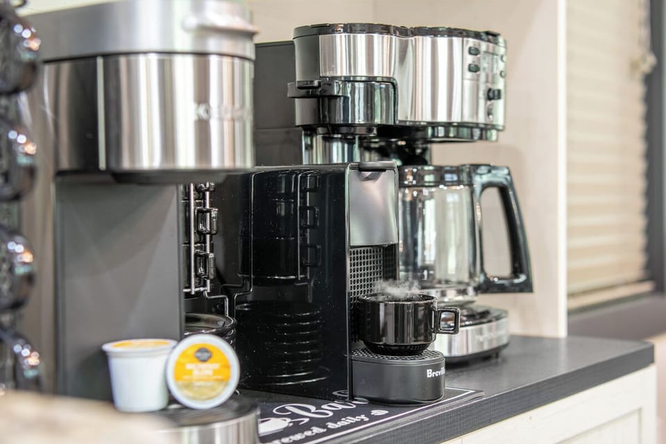 Start each morning right with your own coffee bar, complete with a professional espresso machine and premium brewing station at your fingertips.