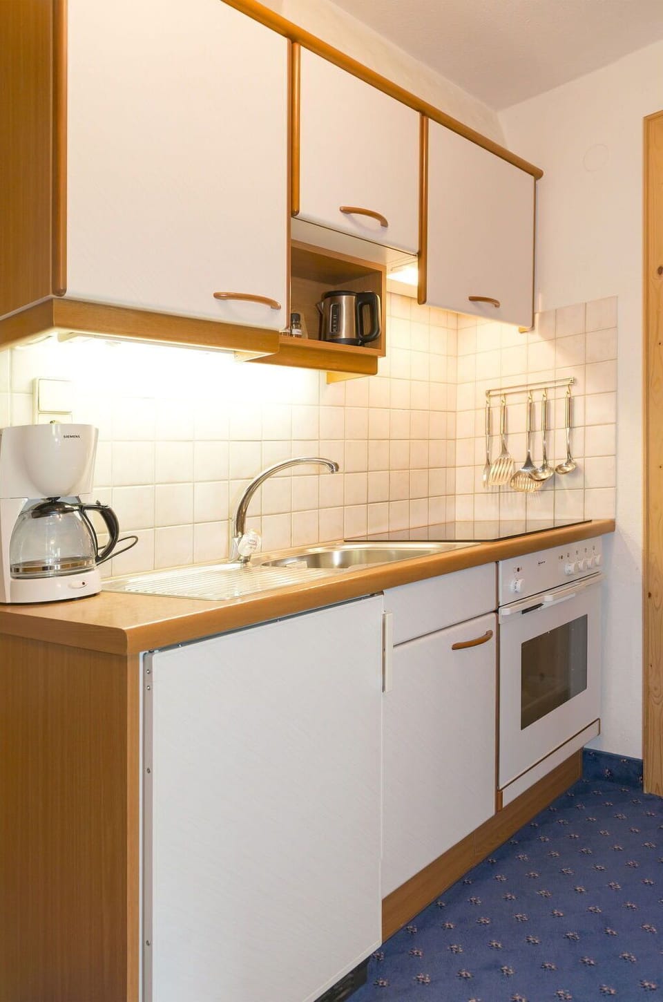 Countertop, Wood, Interior Design, Kitchen, Flooring, Cabinetry, Kitchen Appliance, Sink, Major Appliance, Plumbing Fixture