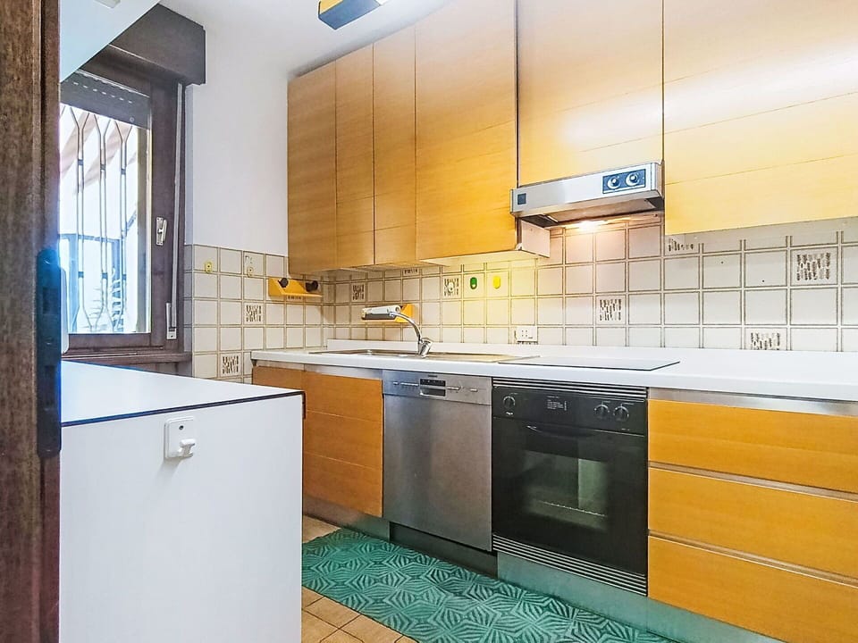 Kitchen, Flooring, Countertop, Major Appliance, Kitchen Appliance, Wood, Interior Design, Cabinetry, Floor, Tile