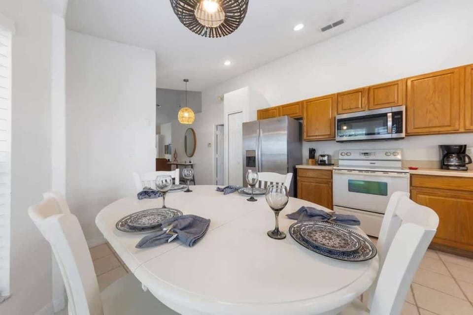 Large dining table with seating for family meals and gatherings