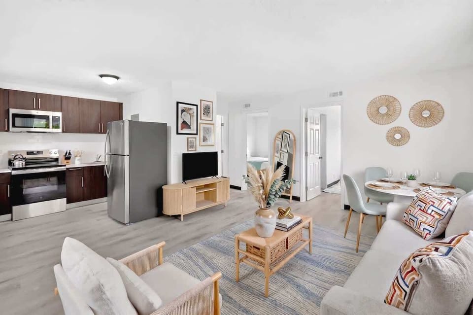 Relax in the inviting living room with comfortable seating and a Smart TV after a day of exploring.