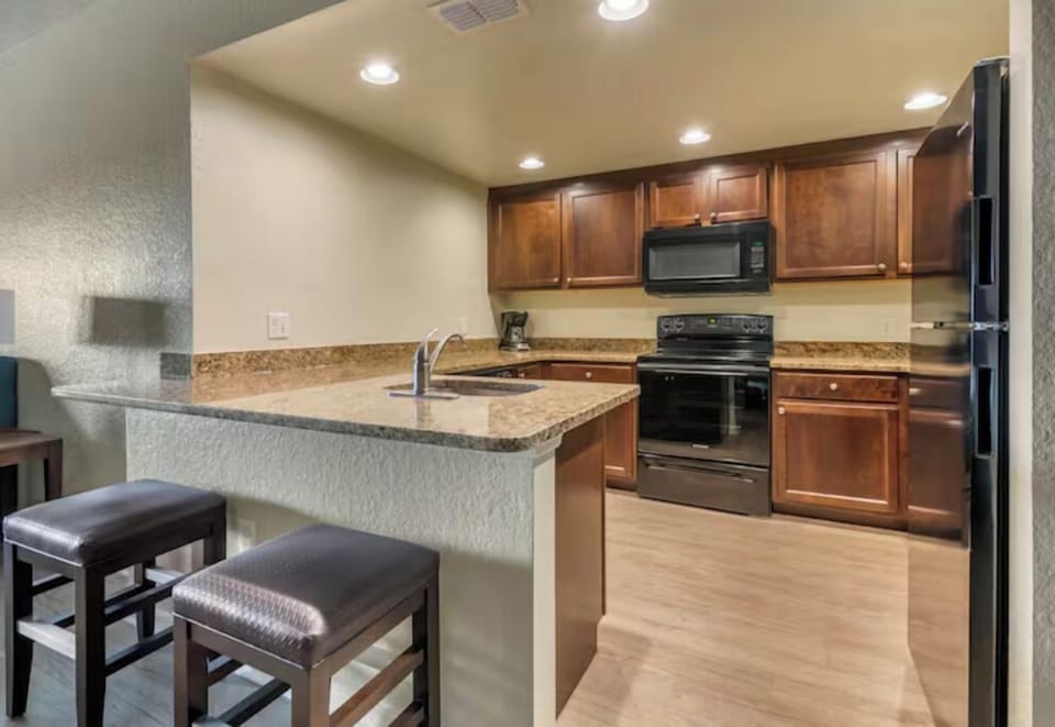 Serve easy breakfasts at the breakfast bar with comfy stools.