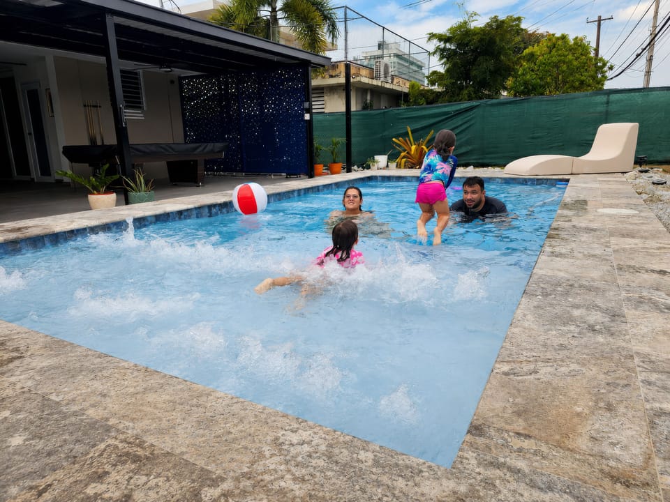 Private family-friendly pool with spacious deck and relaxing lounge area