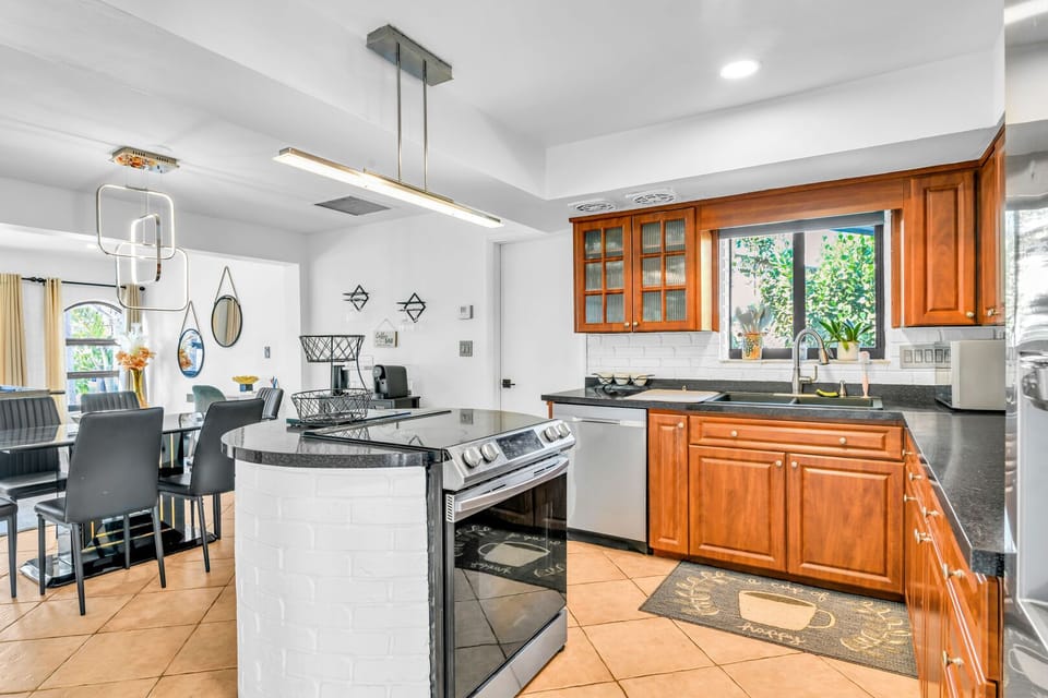 Fully stocked kitchen with all the utensils, pots, pans, and cookware you'll need