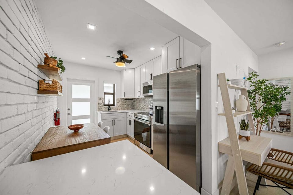 Fully stocked kitchen with
cookware and utensils