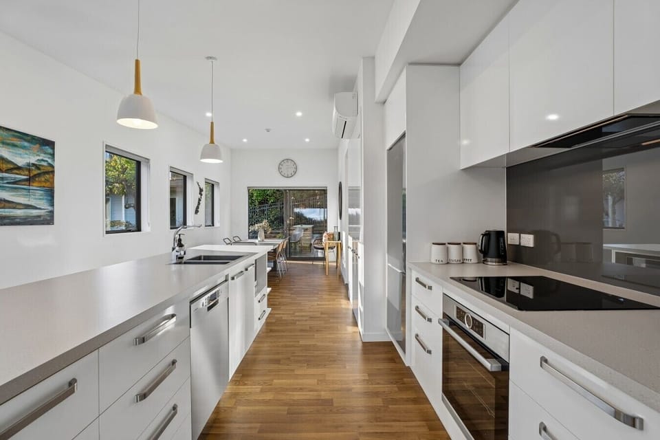 Modern kitchen with pendant lights