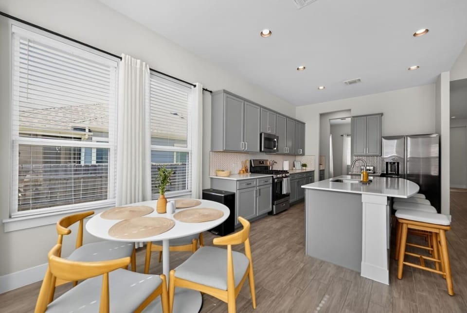 Kitchen has everything you need to cook, plus a cozy nook for morning coffee