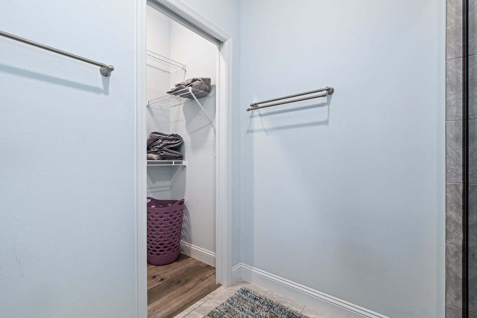 The closet keeps the room feeling organized and comfortable throughout your stay.