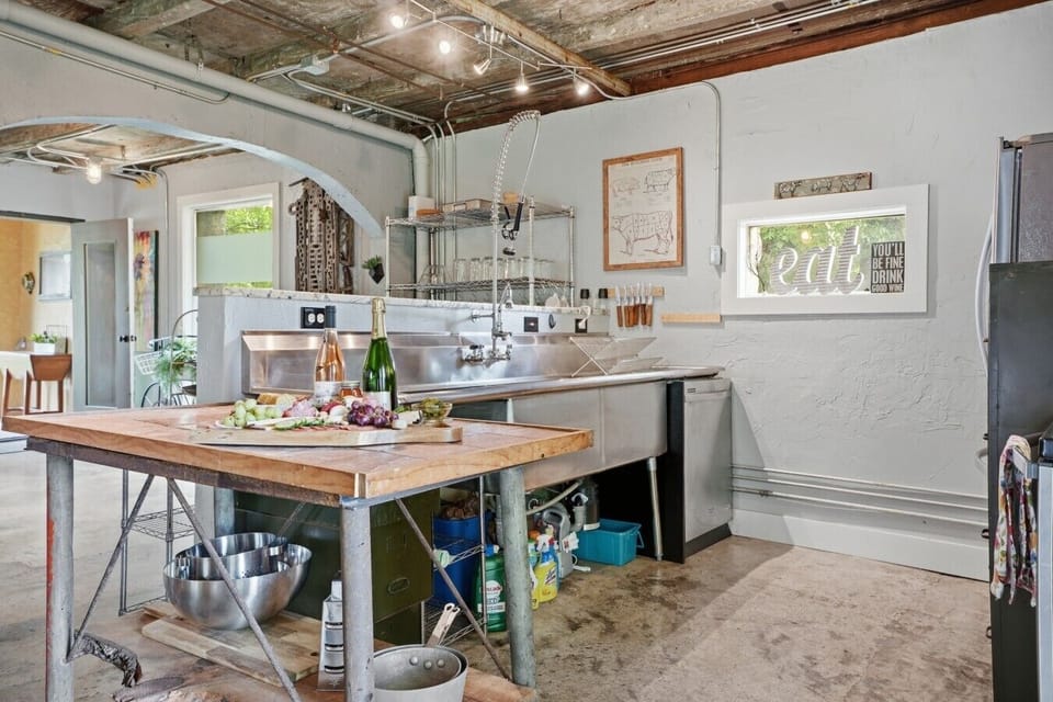 Kitchen | Stainless Steel Appliances & Prep Island | Deep Farmhouse Sink