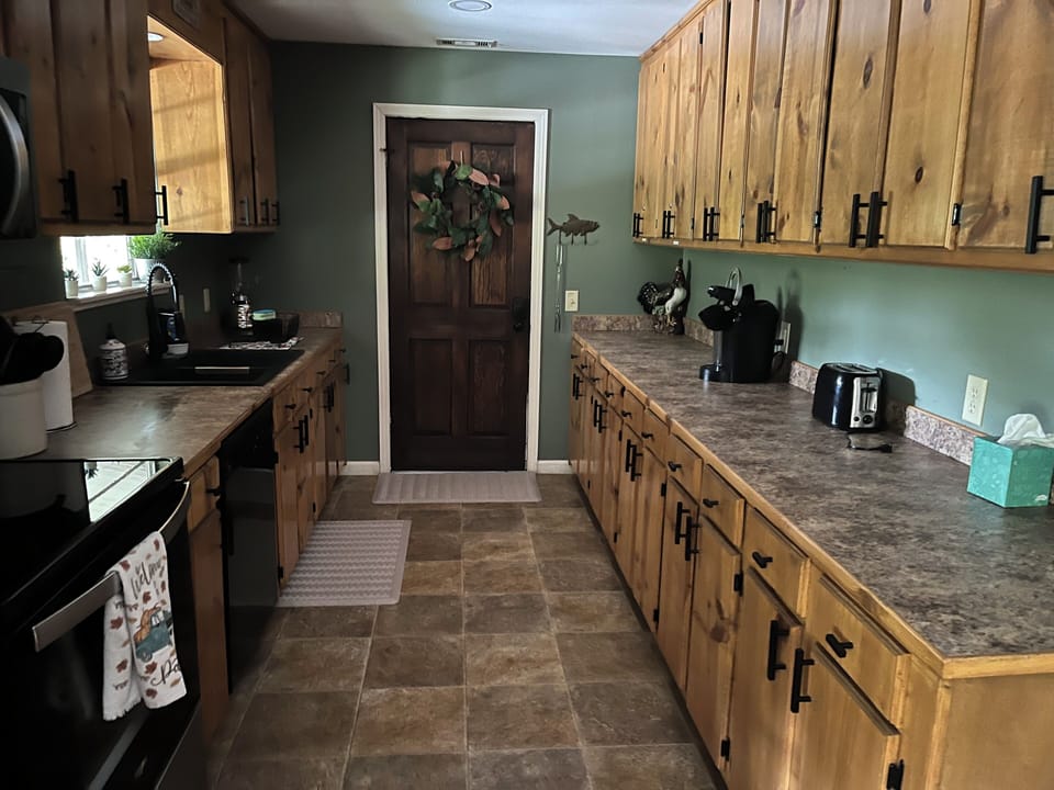 Main level primary kitchen. 
