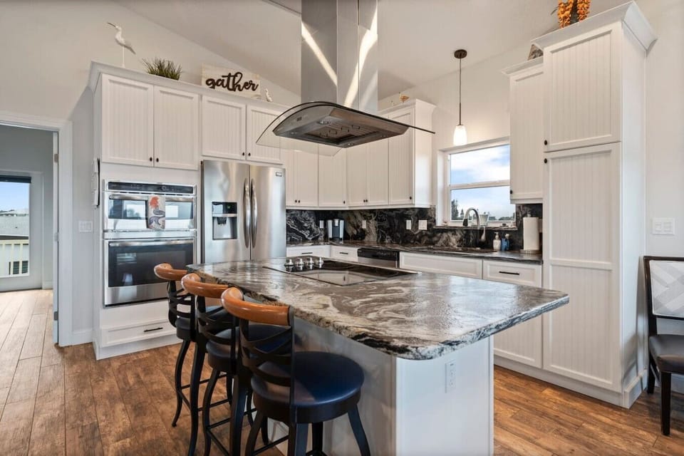 Stainless steel appliances add to the luxurious feel of the kitchen.