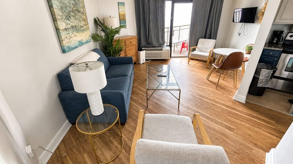 Make yourself at home in the bright, spacious living room. With comfortable seating, a Smart TV, and plenty of room to spread out, it’s the perfect place to relax after a day on the beach, enjoy a movie together, or gather for some quality time with famil