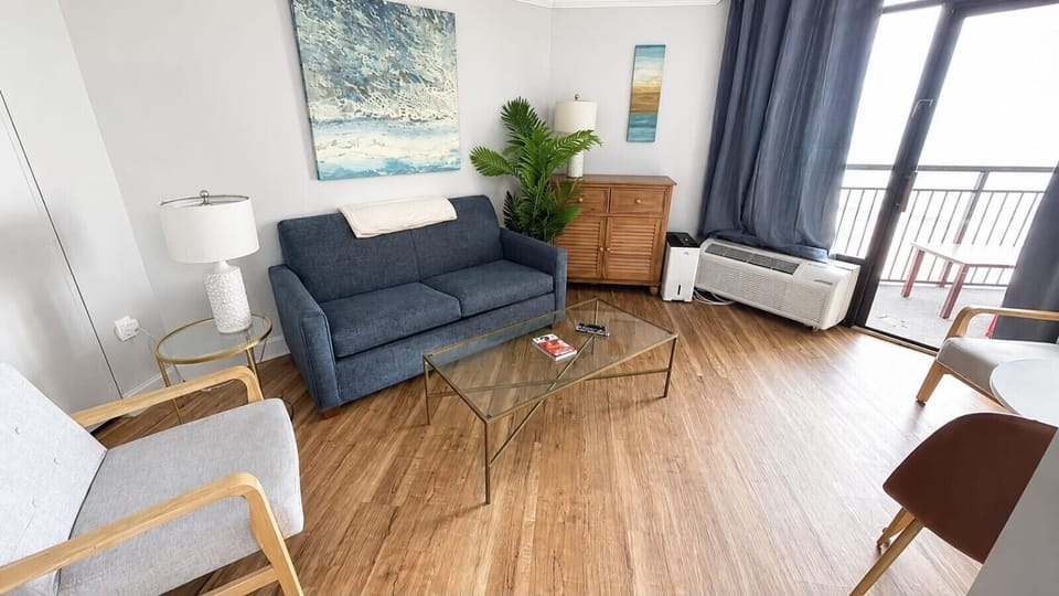 Settle in and enjoy the spacious living room, with plenty of comfortable seating for everyone. Gather around the table for a game night, relax with your favorite shows on the Smart TV, or simply kick back and enjoy quality time together after a day at the
