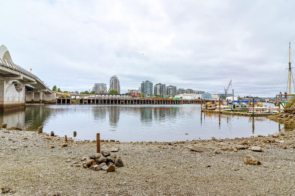 Explore the beautiful shoreline and calm waters located just steps from the property.