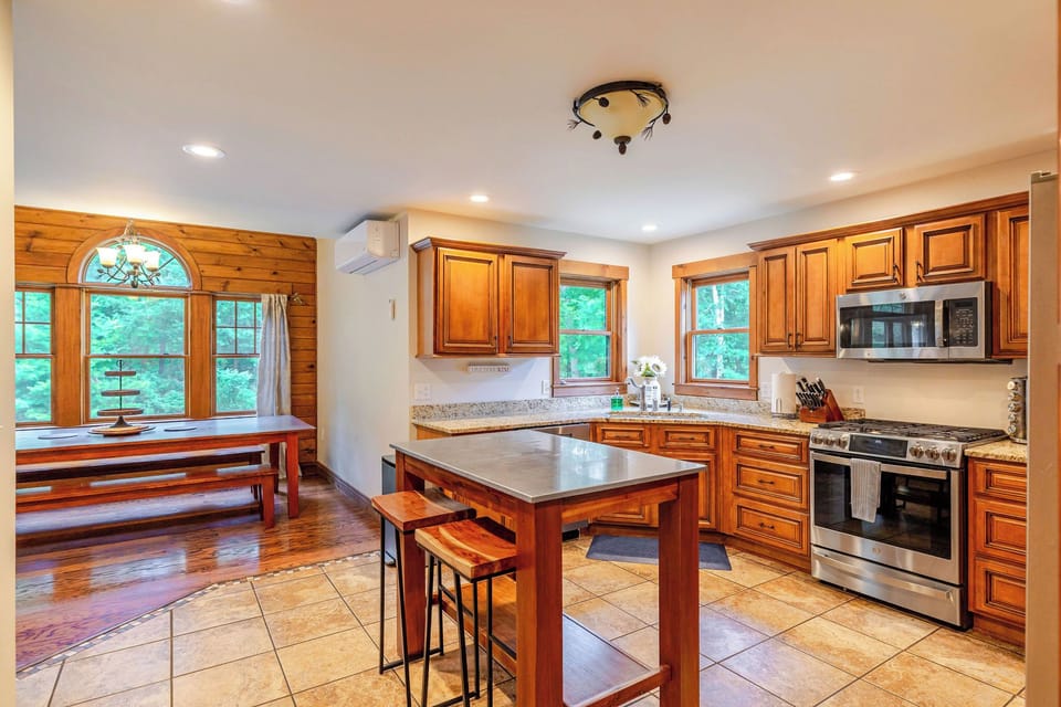 Open kitchen design keeps everyone connected while meals are being prepared.