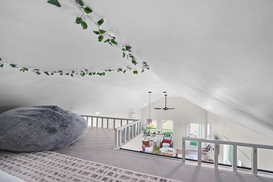 Full bed in loft space at Thor's Cottage