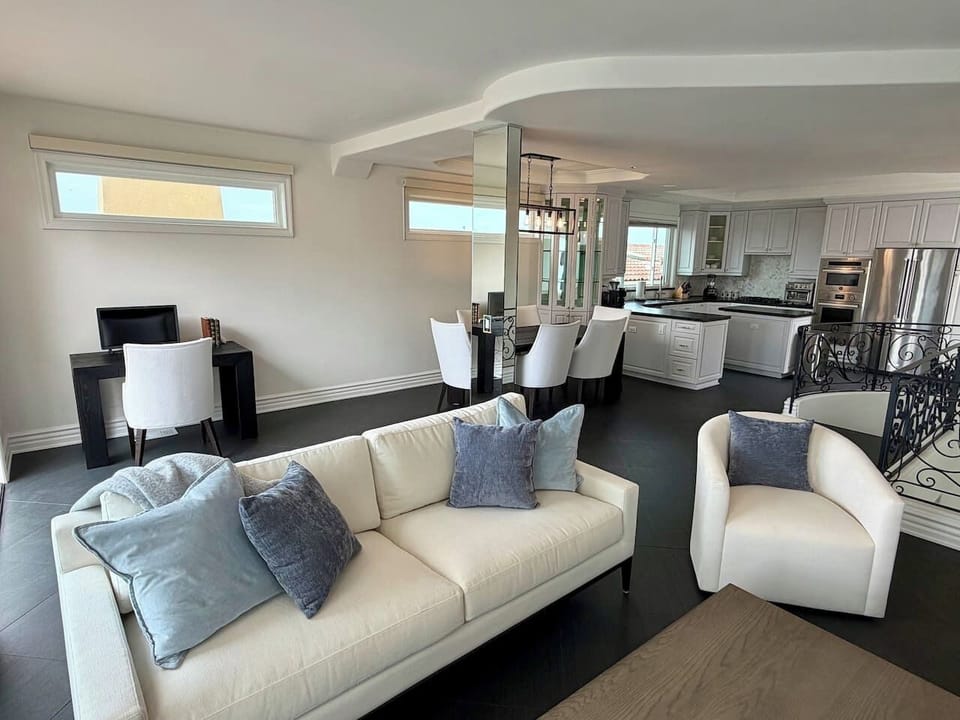 Cozy seating with plenty of natural light streaming in from every angle