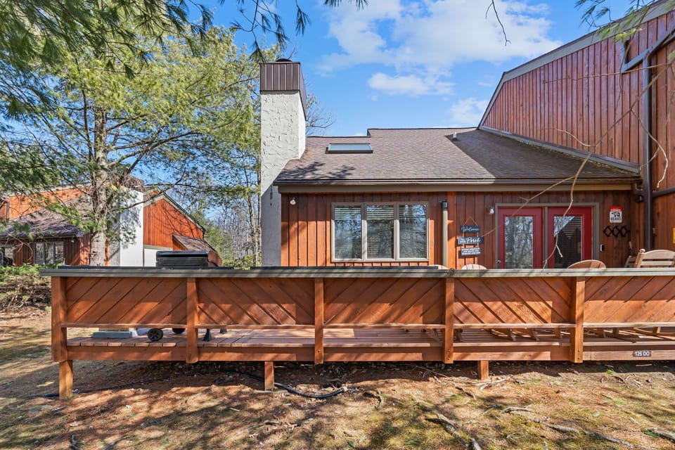 Rear Wrap Around Patio, steps to the lake, club house and pool.  (Seasonal)