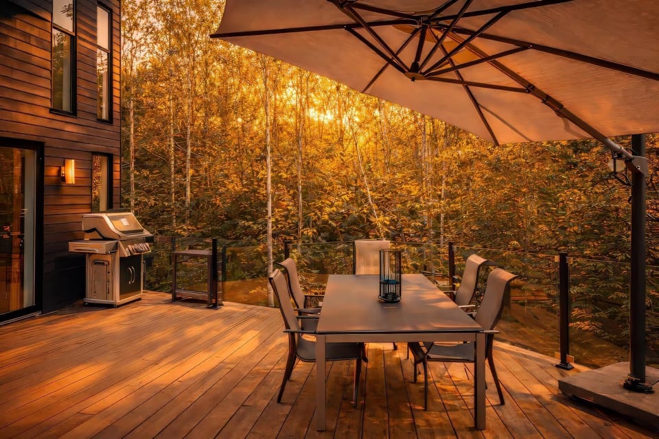 Golden-hour dining surrounded by a sea of leaves