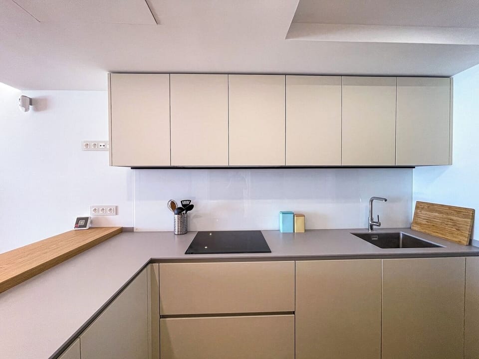 Nice bright kitchen with a lot of work space.